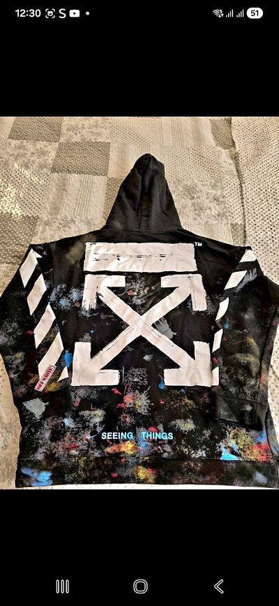 Black Hoodie With Paint Splatter And White Arrow Design
