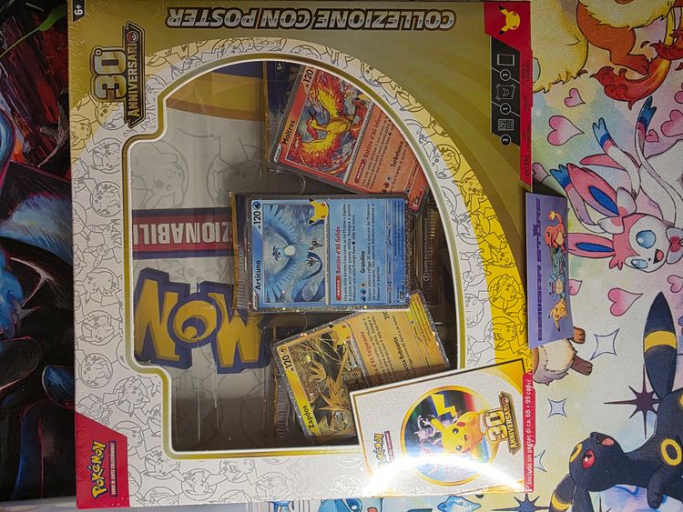 Collezzione con poster 30 th anniversario pokemon  image 1
