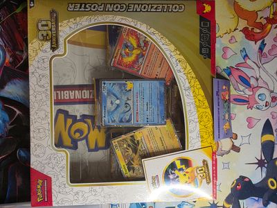 Collezzione con poster 30 th anniversario pokemon