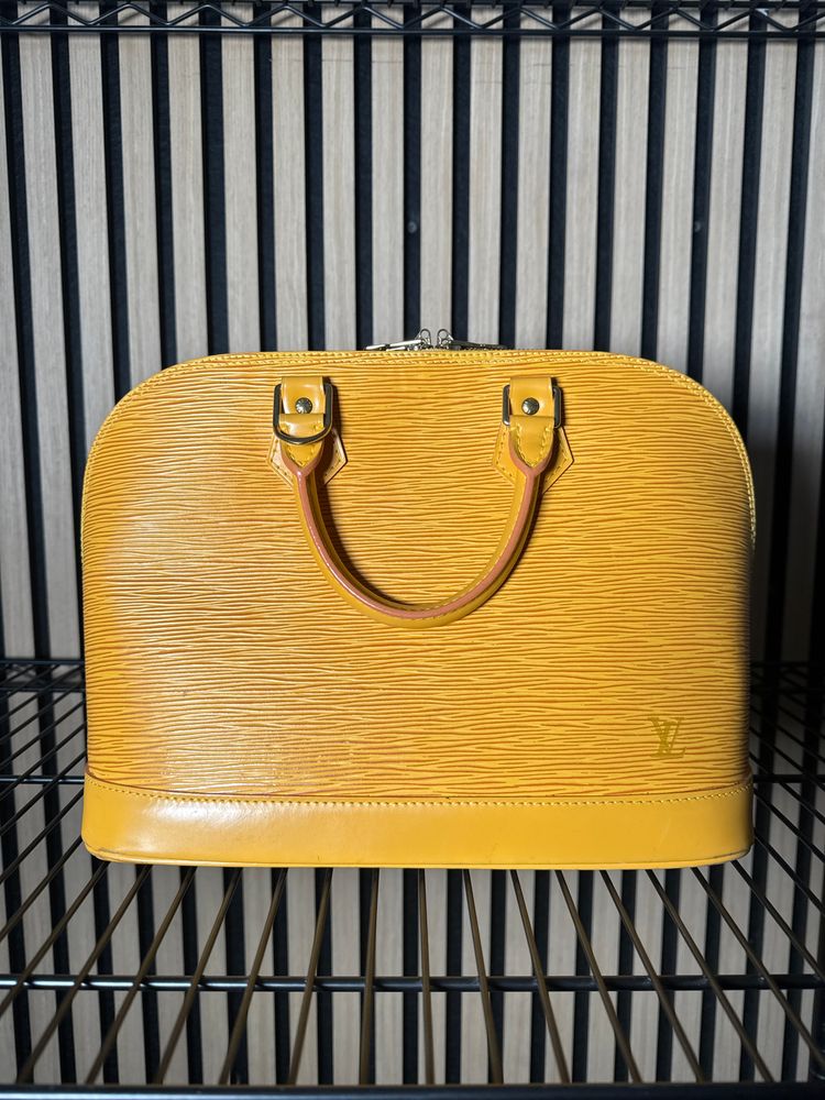 B26 Louis Vuitton Epi Alma Yellow tassil 