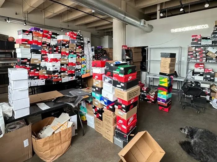 Stack Of Assorted Sneaker Boxeshite givvy