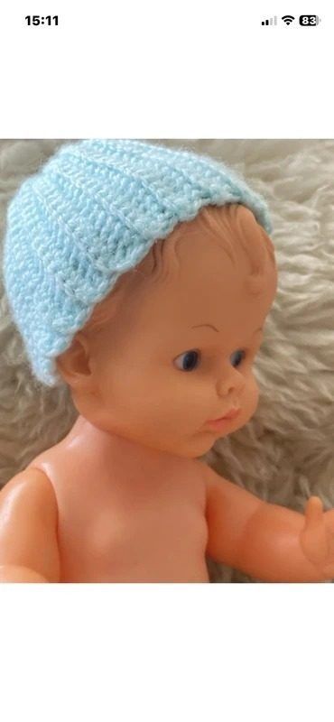 Baby Doll With Blue Knitted Hat And Diaper obraz 2