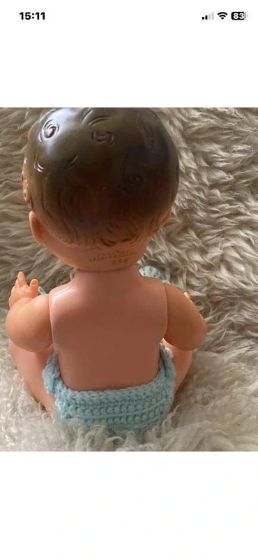 Baby Doll With Blue Knitted Hat And Diaper image 1