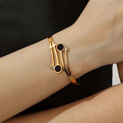Gold-Tone Bracelet With Black And Clear Stone Accents