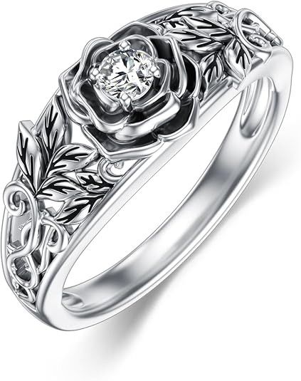 Silver Ring With Floral Design And Central Gemstone image 1