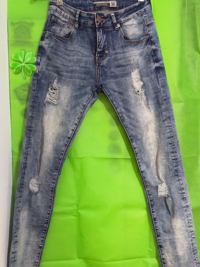 Vaqueros azules desgastados