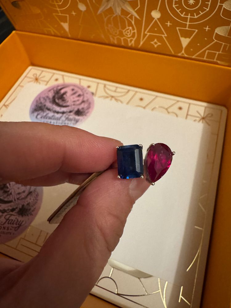 Ring With Blue And Red Gemstones
