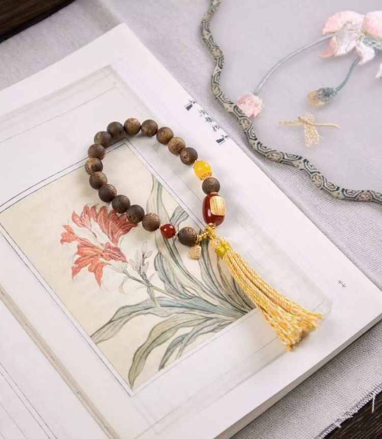 Wooden Bead Bracelet With Yellow Tassel image 1