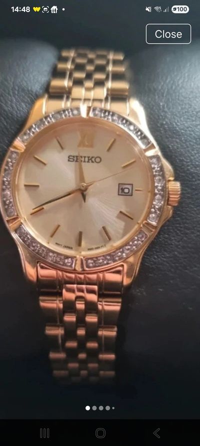 Seiko Gold-Tone Wristwatch With Date Display