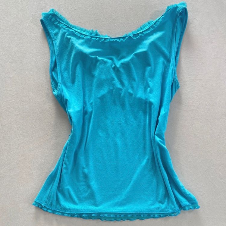Blue Sleeveless Top With Ruffle Details And Bow imagen 4