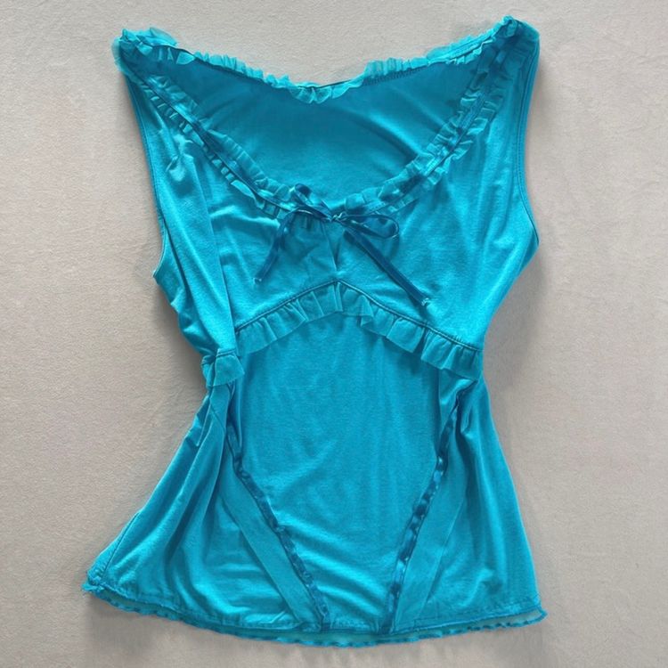 Blue Sleeveless Top With Ruffle Details And Bow