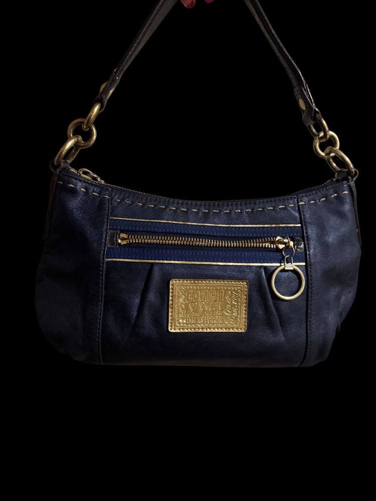 Black Leather Handbag With Gold Zipper And Patch