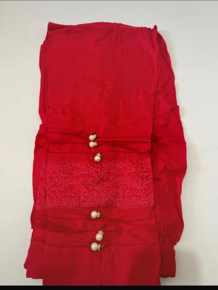 Red Garment With Pearl Buttons