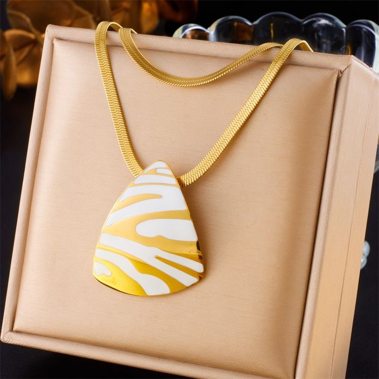 Gold-Tone Layered Necklace With White And Gold Abstract Pendant image 4