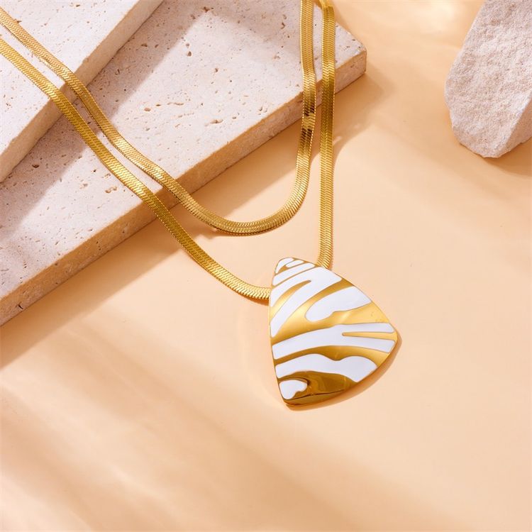 Gold-Tone Layered Necklace With White And Gold Abstract Pendant image 1