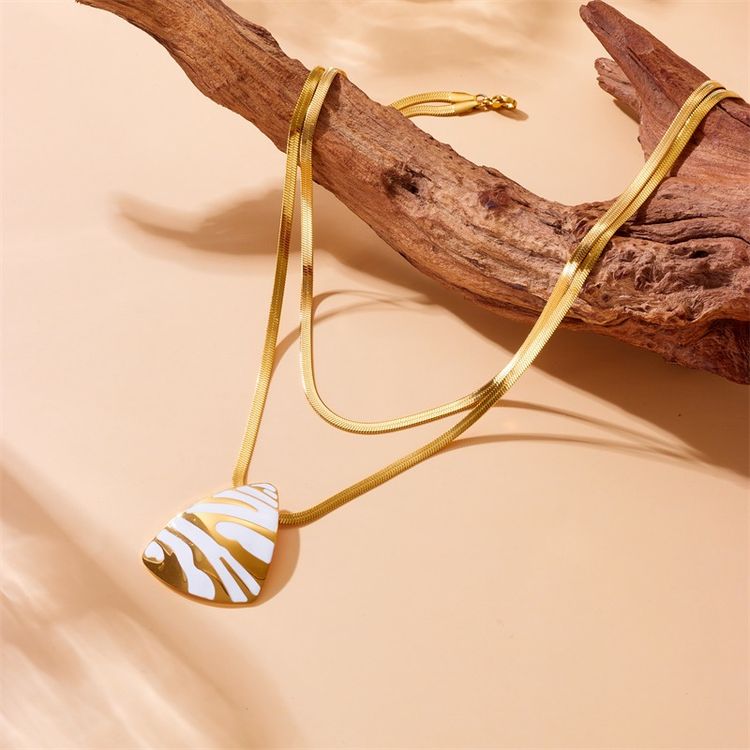 Gold-Tone Layered Necklace With White And Gold Abstract Pendant image 5