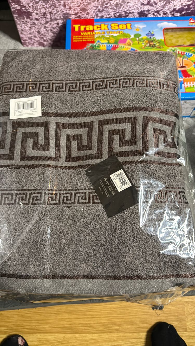 Grey Towel With Geometric Pattern