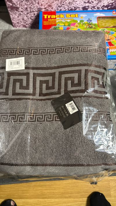 Grey Towel With Geometric Pattern