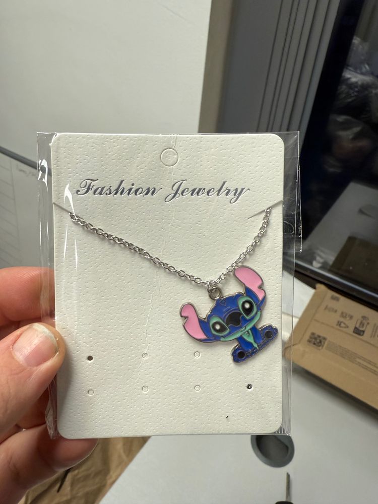 blue character pendant necklace