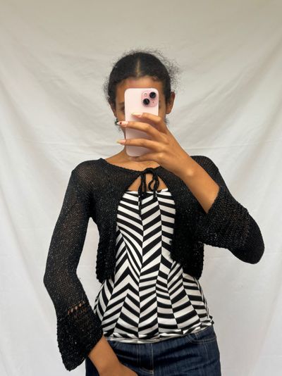 black and white striped top with black knit shrug