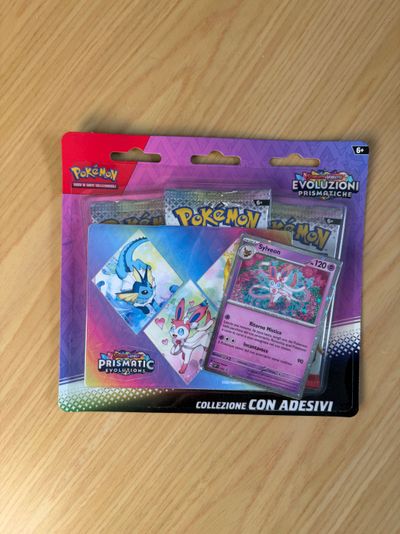Pokémon Evoluzioni Prismatiche Collezione Con Adesivi