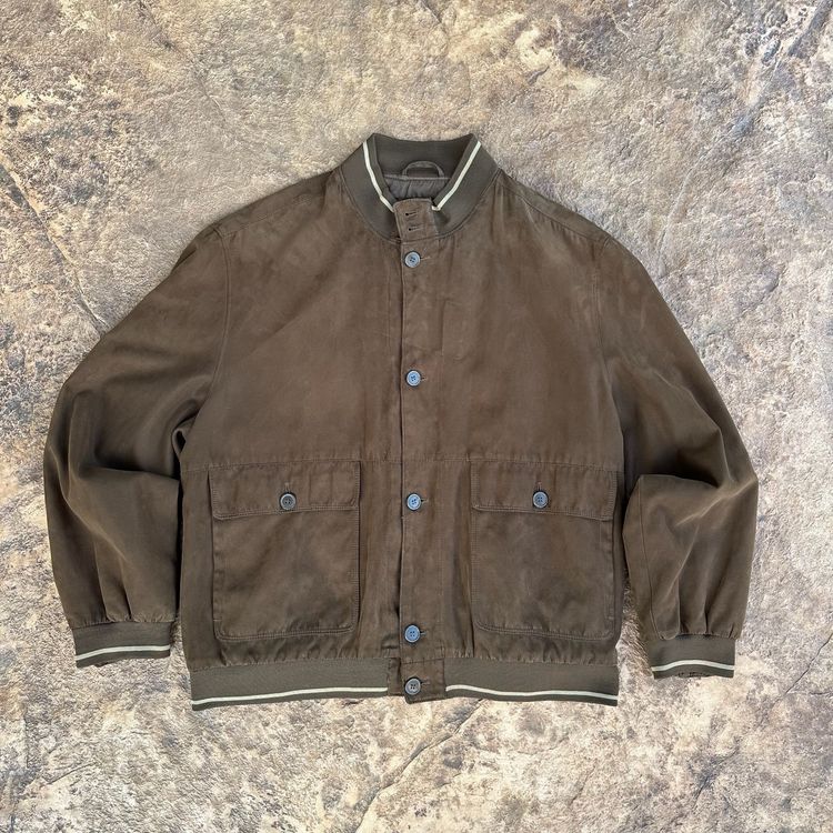 Brown Jacket Sea Barrier