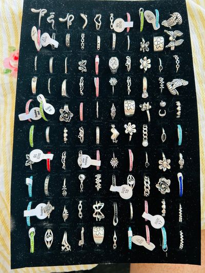 100 Assorted Silver Rings