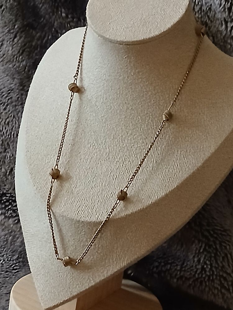 Avon ​Vintage Signed Avon Gold Tone Station Necklace with Textured Barrel Beads product image