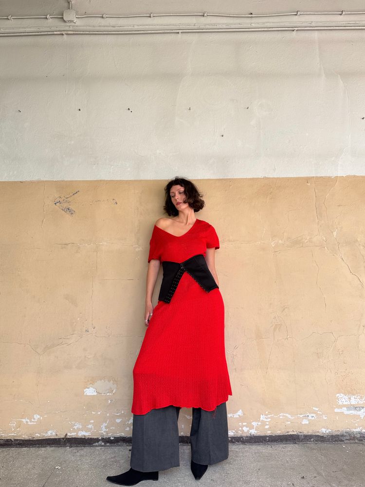 Ralph Lauren red asymmetrical knit dress with black corset belt and gray wide-leg pants product image