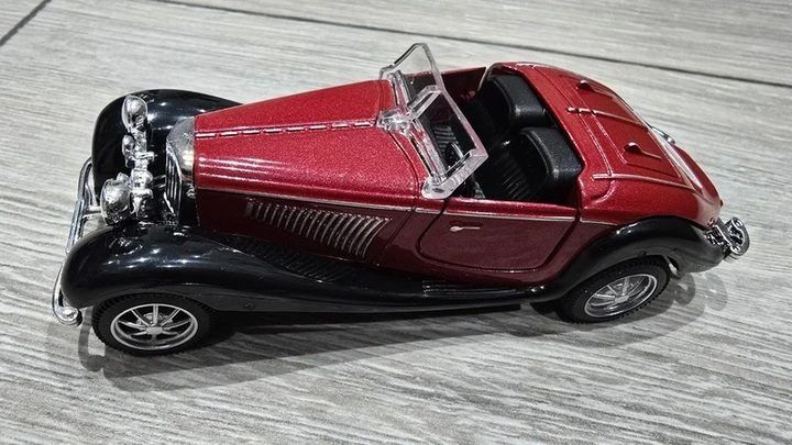 Red And Black Toy Car Model image 3