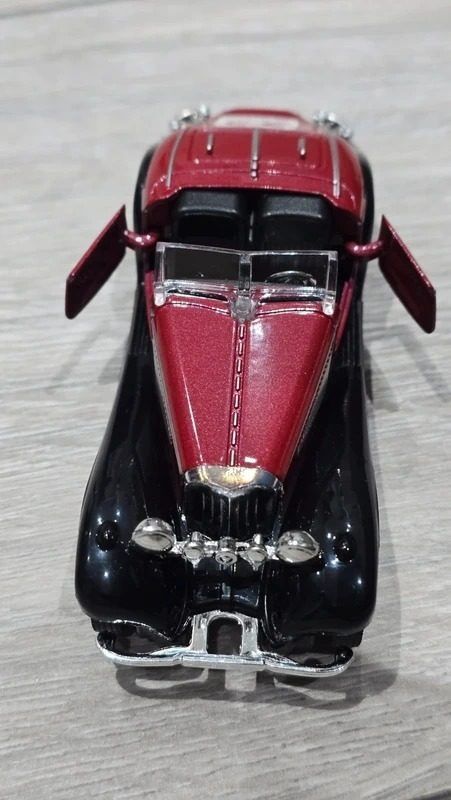Red And Black Toy Car Model image 1