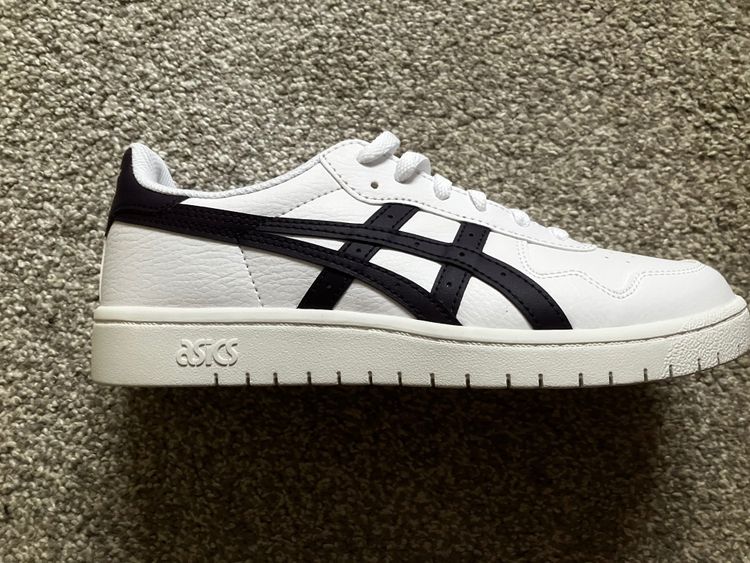 Asics White Sneaker With Black Stripes