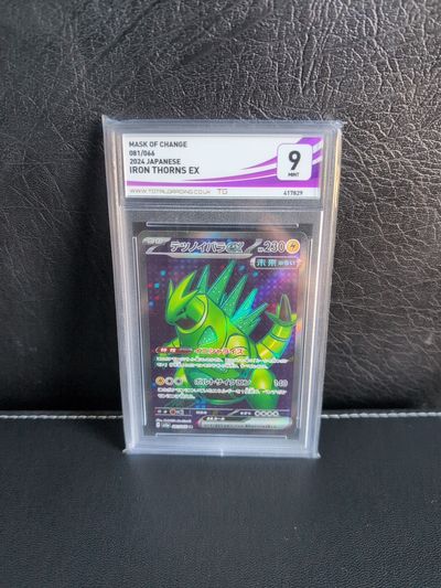 Iron Thorns Ex Trading Card