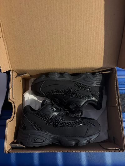 New Balance Black Sneakers