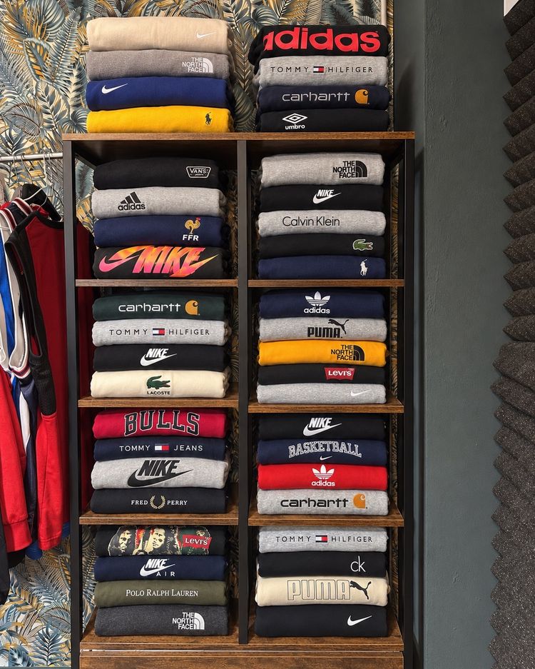 Stacked Folded Sweatshirts And Hoodies image 1