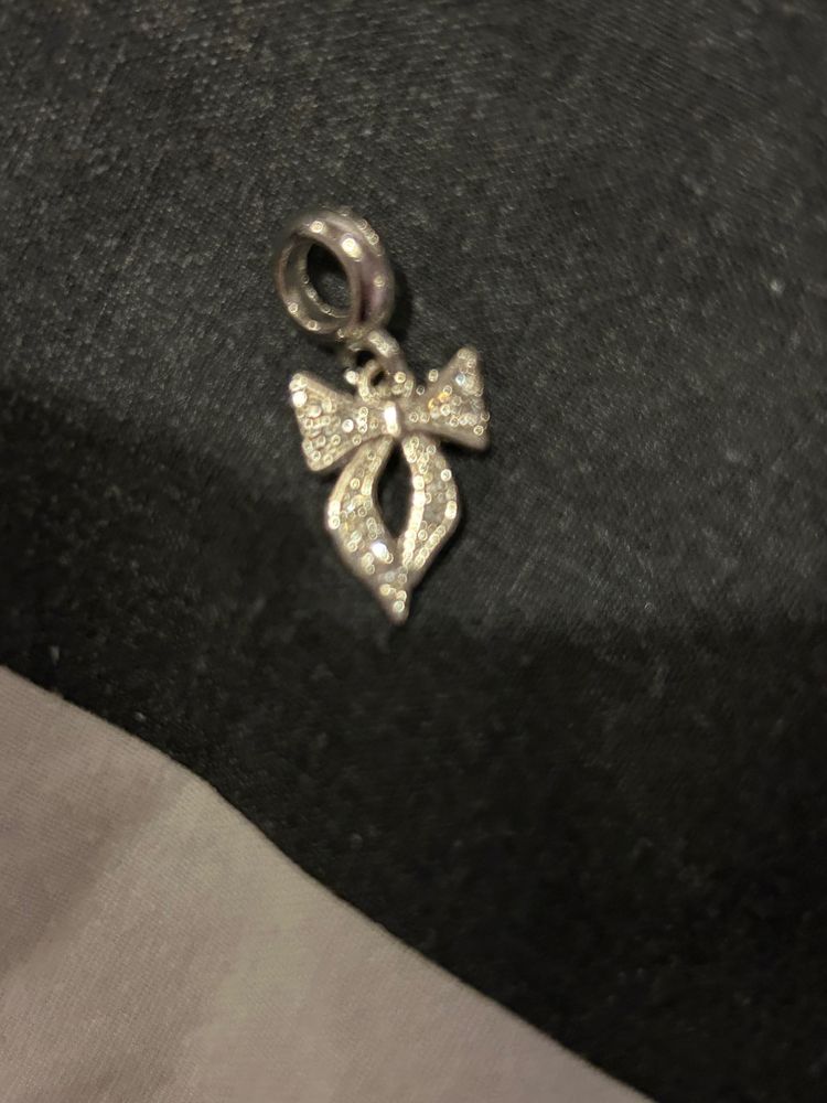 Silver Charm Pendant With Bow And Rhinestones