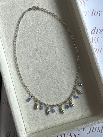 Silver Chain Necklace With Blue And Silver Charms
