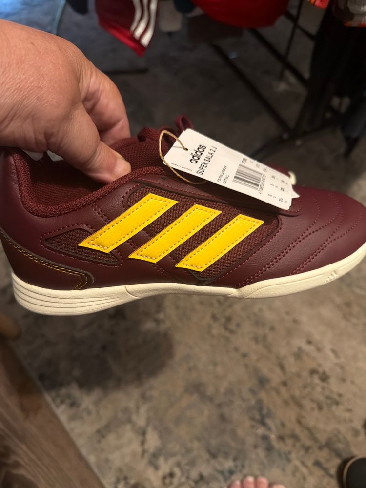 Adidas Maroon Sneaker With Yellow Stripes