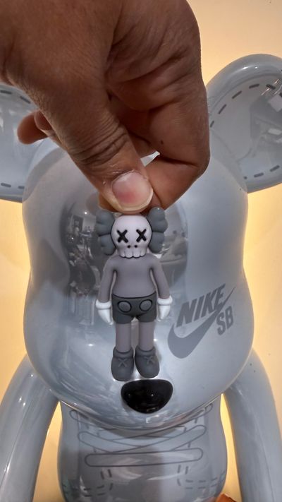 Gray Kaws Figure With Skull Face