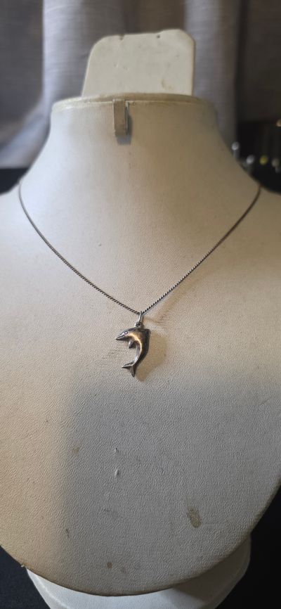£18). 925 sterling silver Silver Dolphin Pendant Necklace