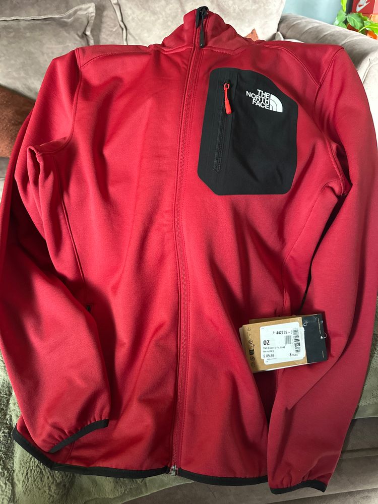 The North Face Red Jacket With Black Chest Pocket