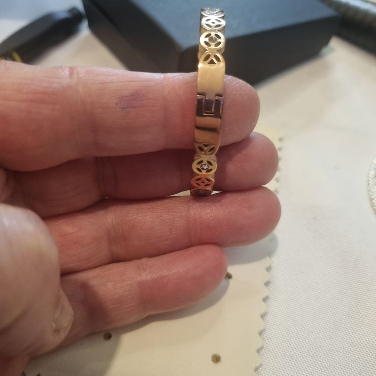 Gold-Tone Bracelet With Circular Cutout Design