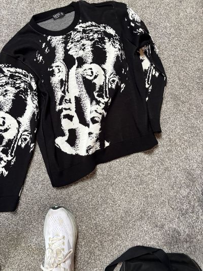 Black Sweater With White Abstract Face Pattern