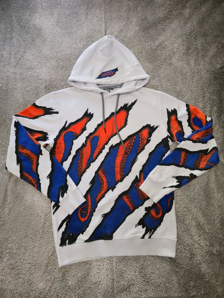 White Hoodie With Red And Blue Abstract Pattern