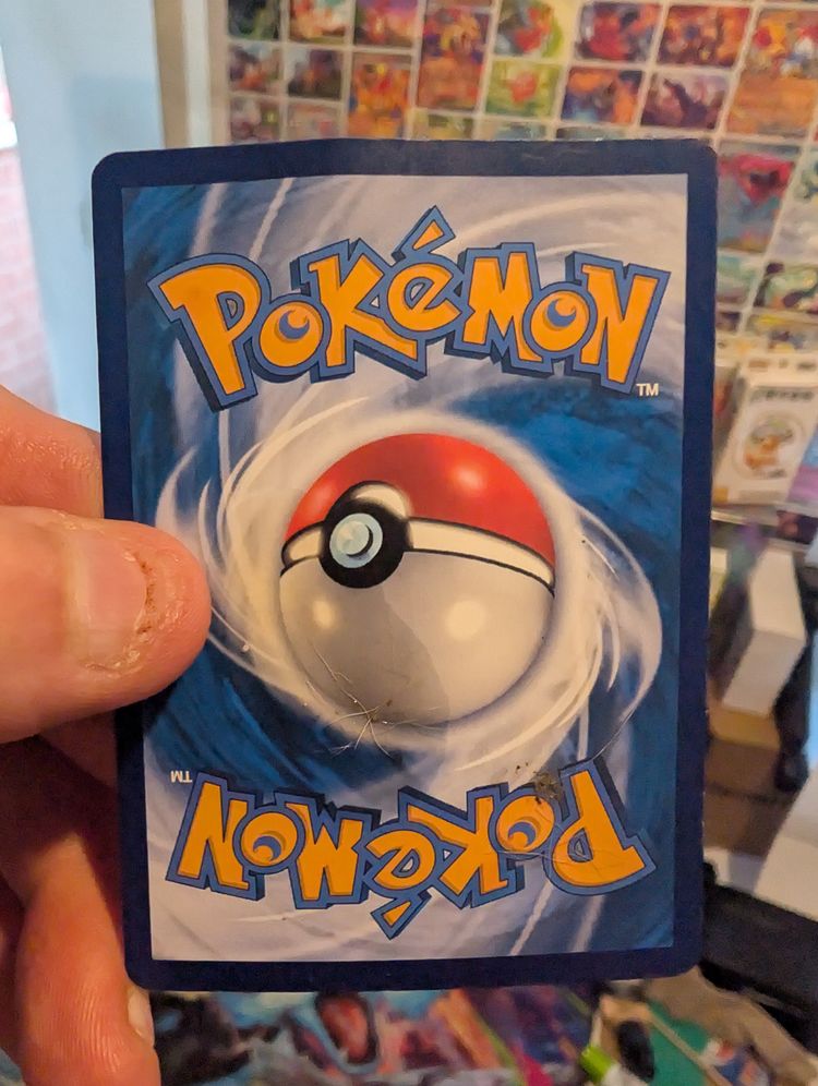 Single Pokémon card on screen  1