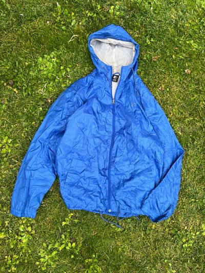 blue hooded windbreaker jacket