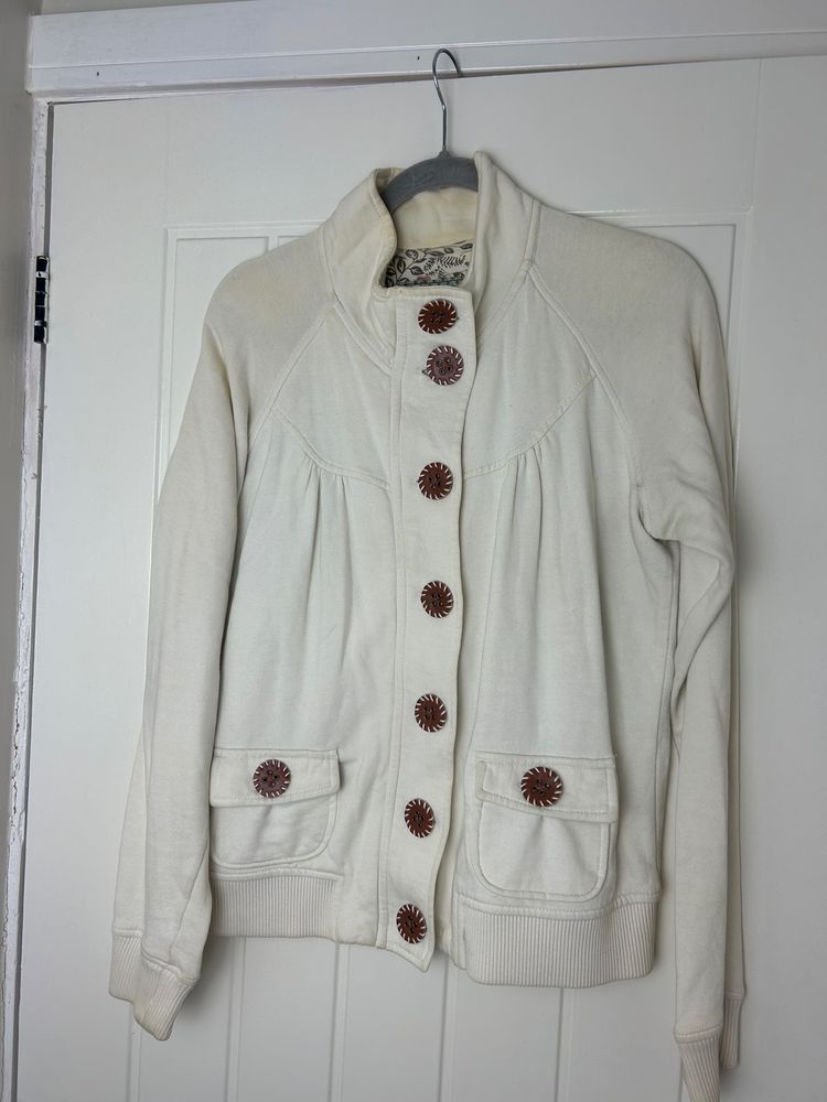 cream button-up jacket