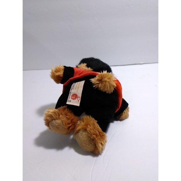 Plush Toy Dog In Red And Black Outfit imagen 1