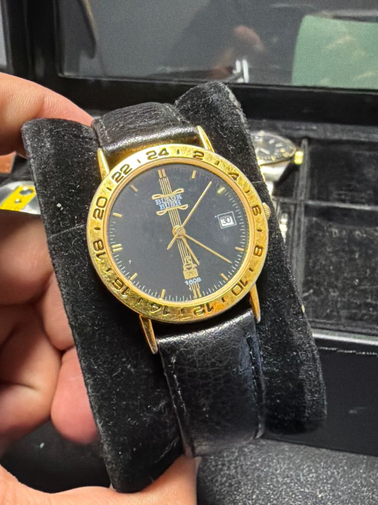Black And Gold Wristwatch