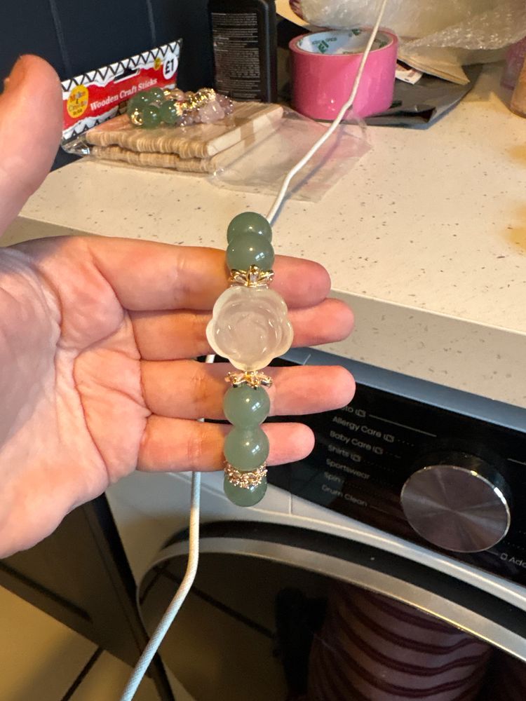 Green Beaded Bracelet With Central Carved Stone